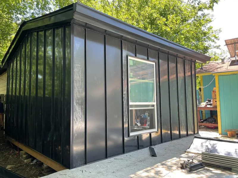 Black standing seam metal wall panels for Roof Inspection in Lake Barcroft